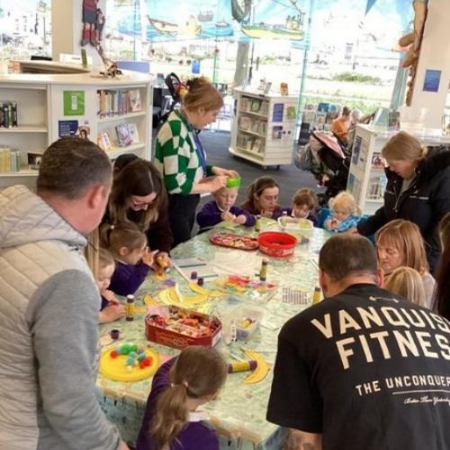 Nursery - taking our parents to join the local library and get our book start packs.