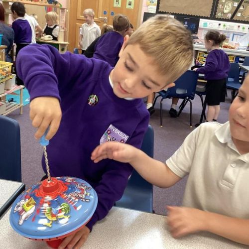 Family visitors in Year 1 to help us learn about toys from the past